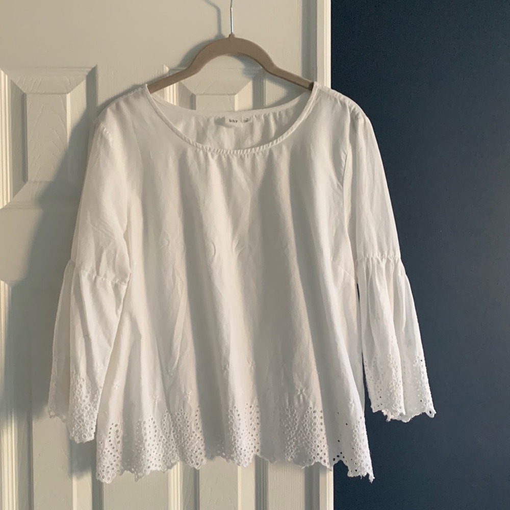 White eyelet bell sleeve blouse